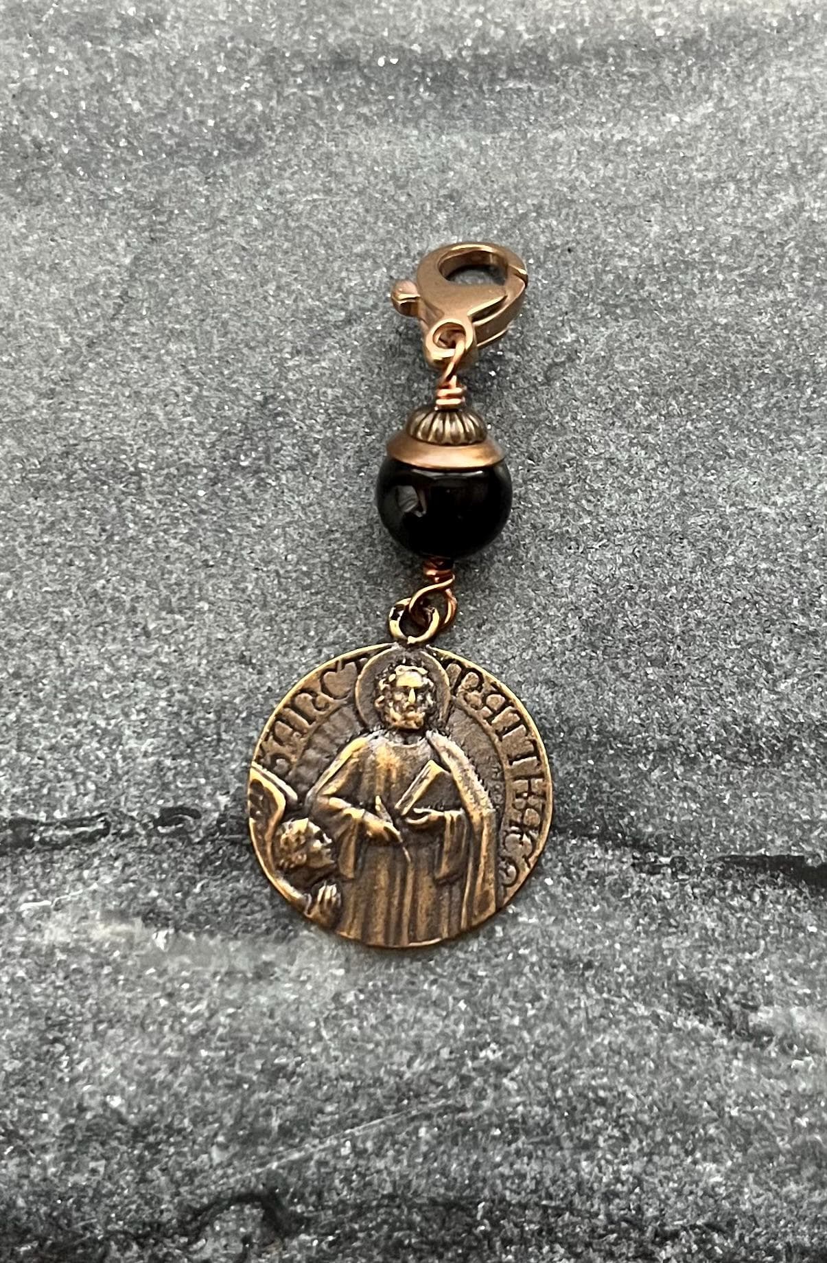 Bag Charm Saint Matthew Zipper Pull - Bronze and Onyx